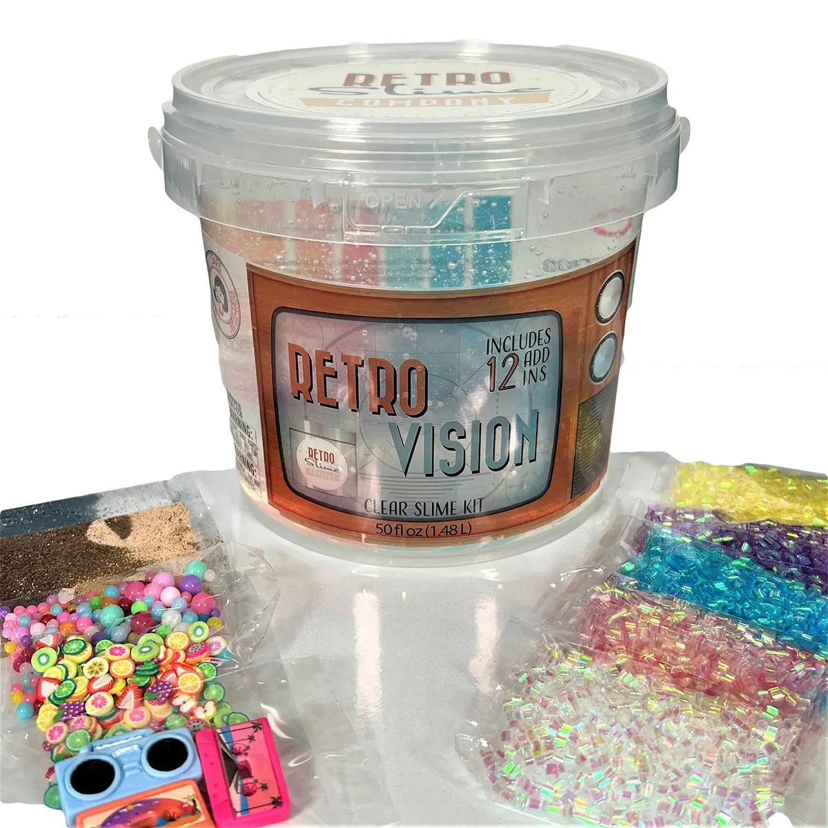 RetroVision Clear Slime Kit including a clear slime base, Bingsu beads, various retro charms, silver and gold glitter, colorful beads, and Fruit FIMO™ slices, capturing the essence of television's golden age.